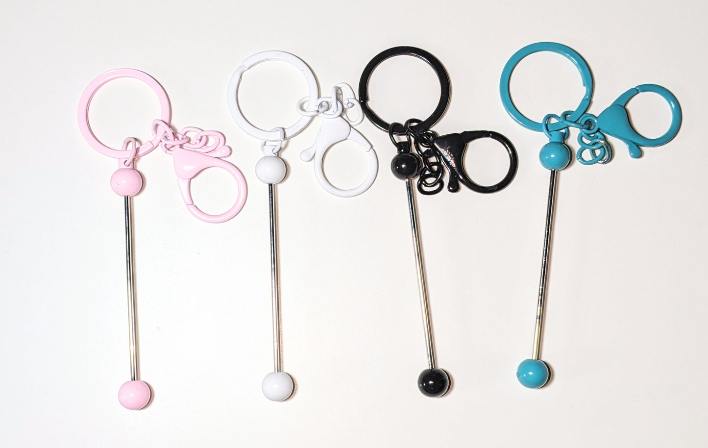 Schlüsselanhänger mit bestückbarer metallstange und Clip