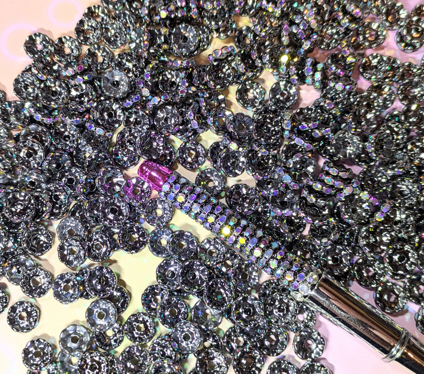 S100 Spacer / Abstandsperlen 10 mm antrazit mit Regenbogenstrassperlen