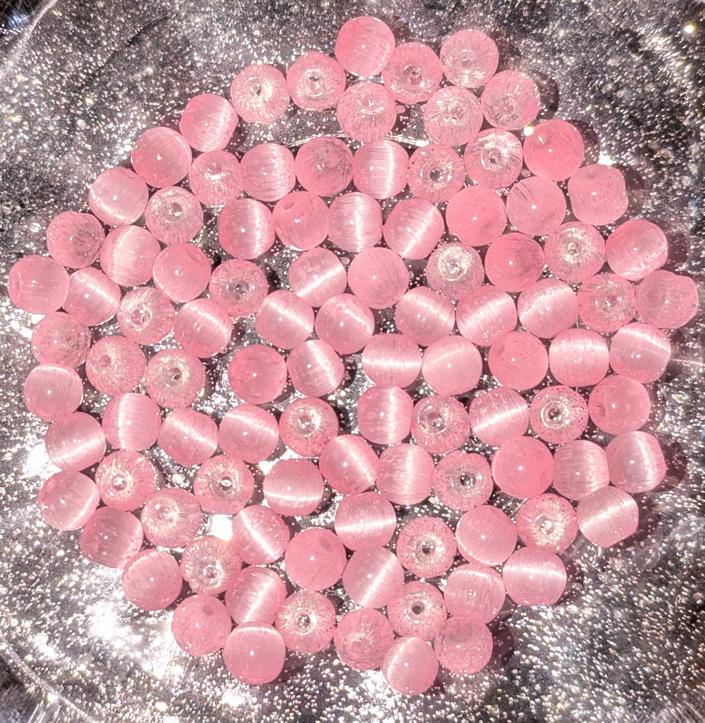 6 mm Glasperlen rosa mit Katzenaugen Effekt