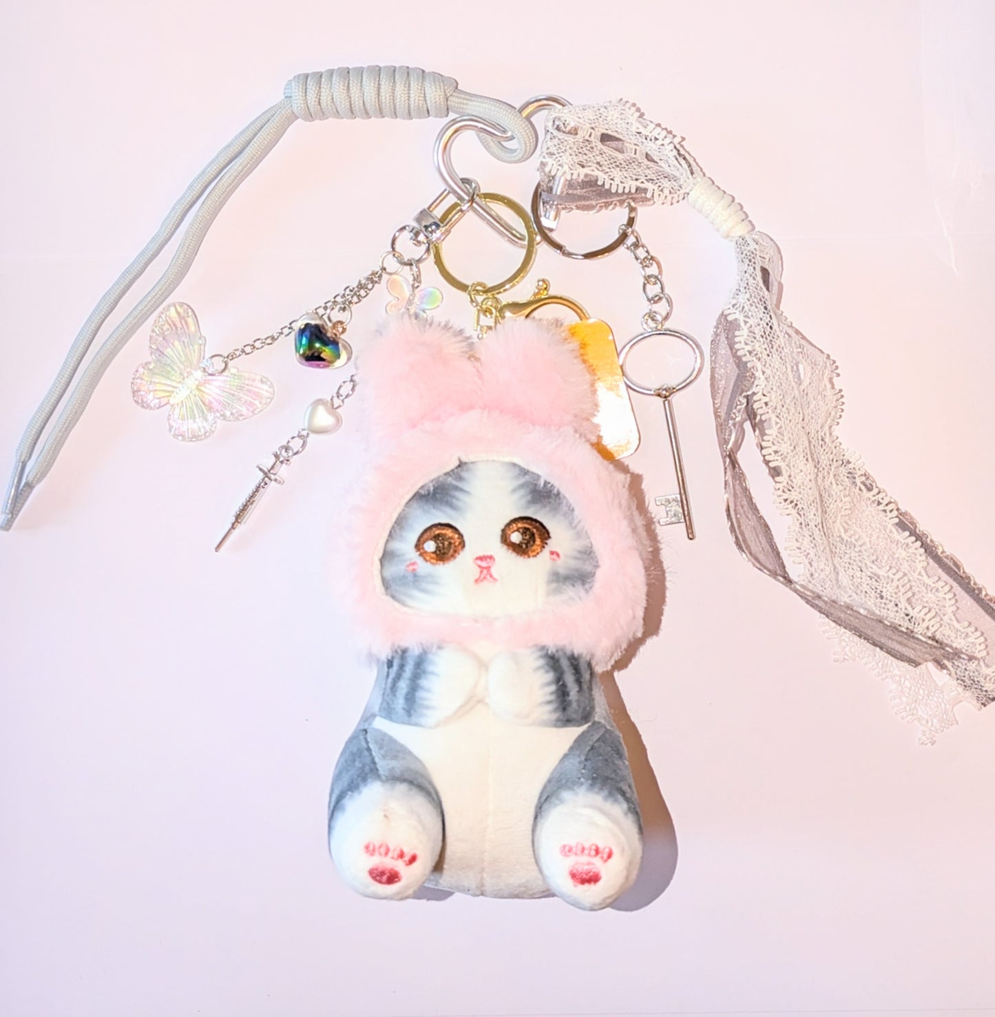 Taschenbaumler mit großem Katzenkuscheltier Spritzenanhänger Schmetterlingen und vielem mehr