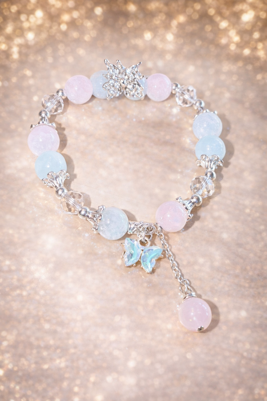 Glasperlenarmband rosa-blau mit Schmetterlingen Anhängern