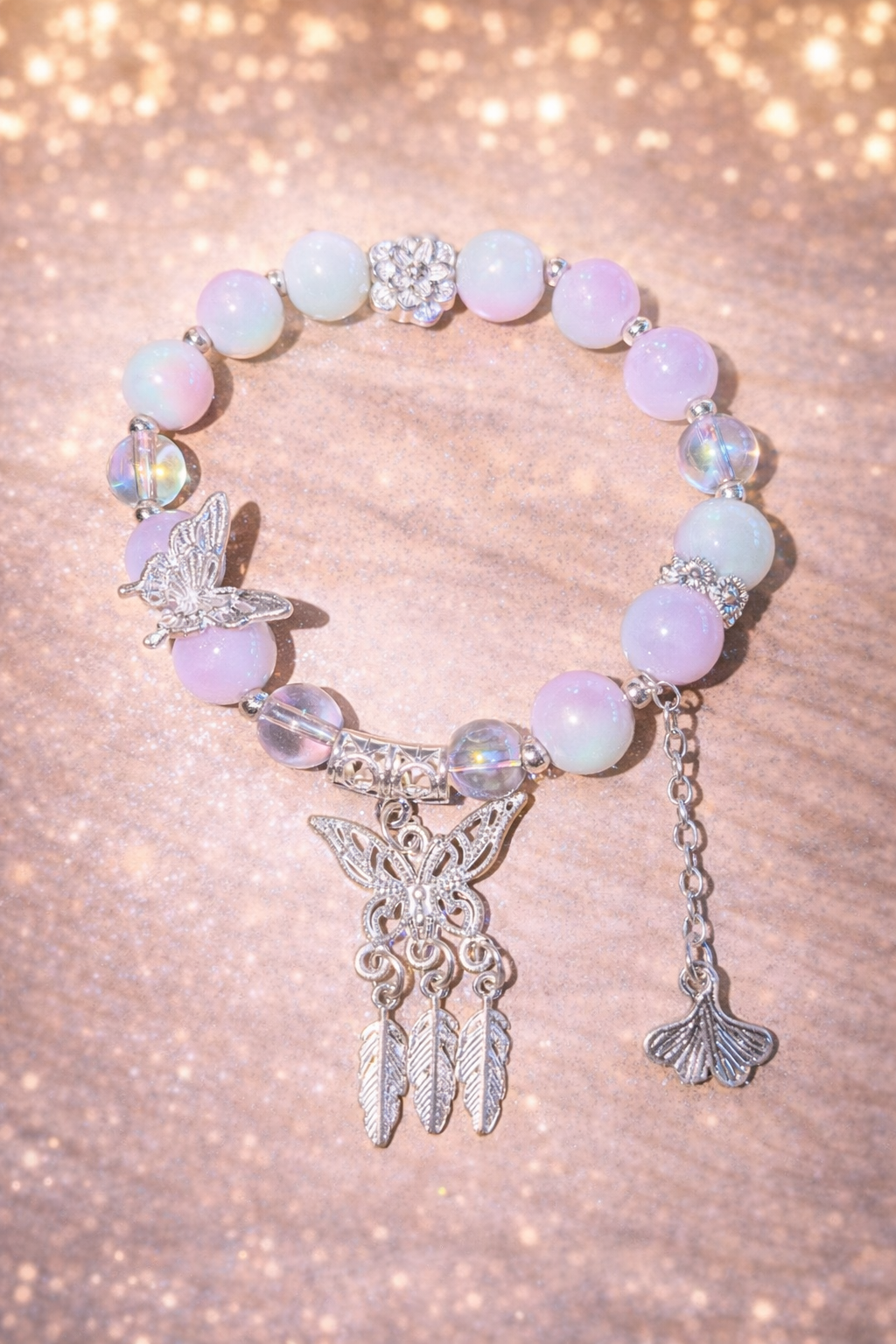 Glasperlenarmband lila- grün mit Schmetterling Traumfänger Anhänger