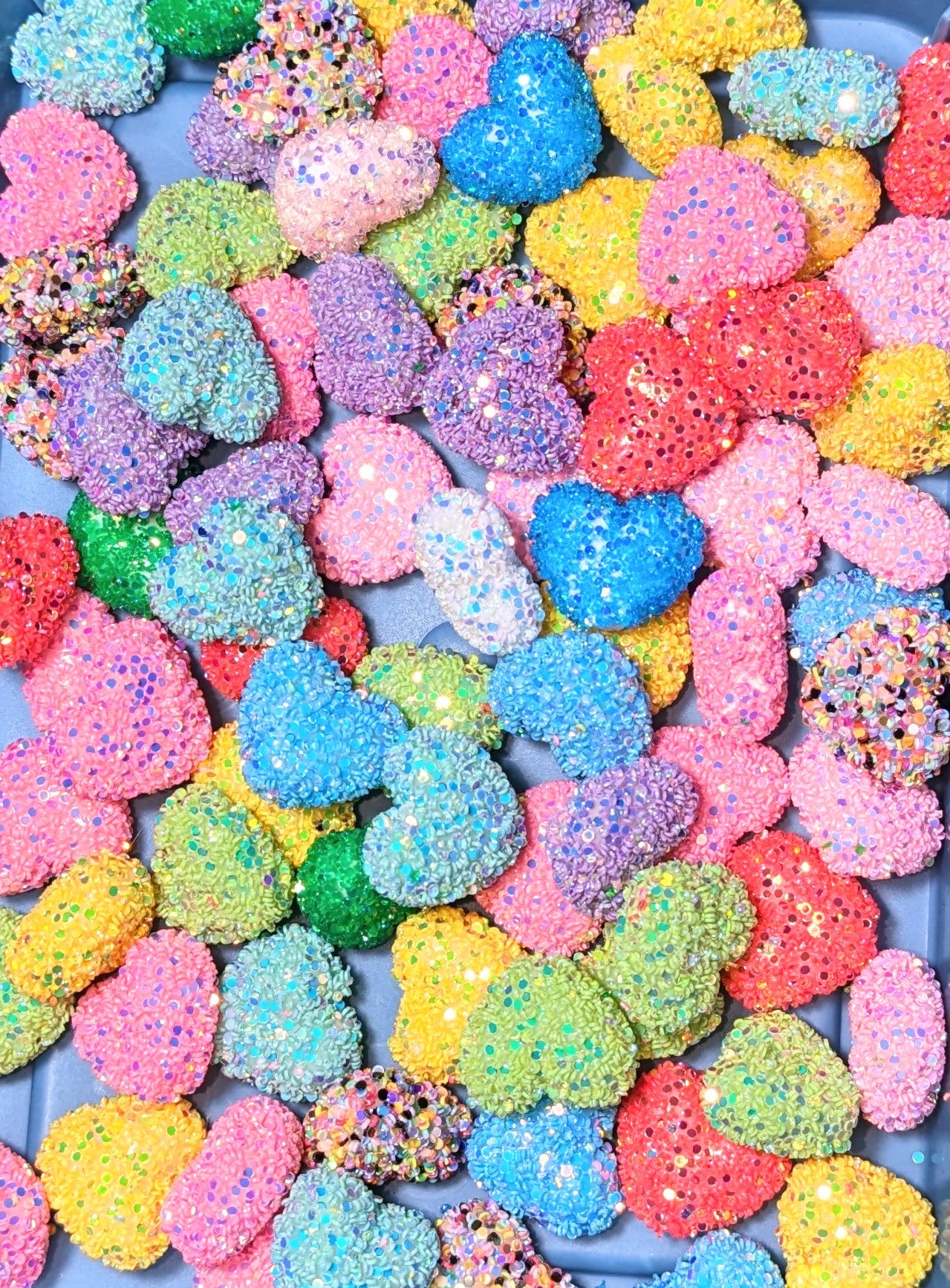 kleine Glitzerkonfettiherzen als Pentopper in verschiedenen Farben