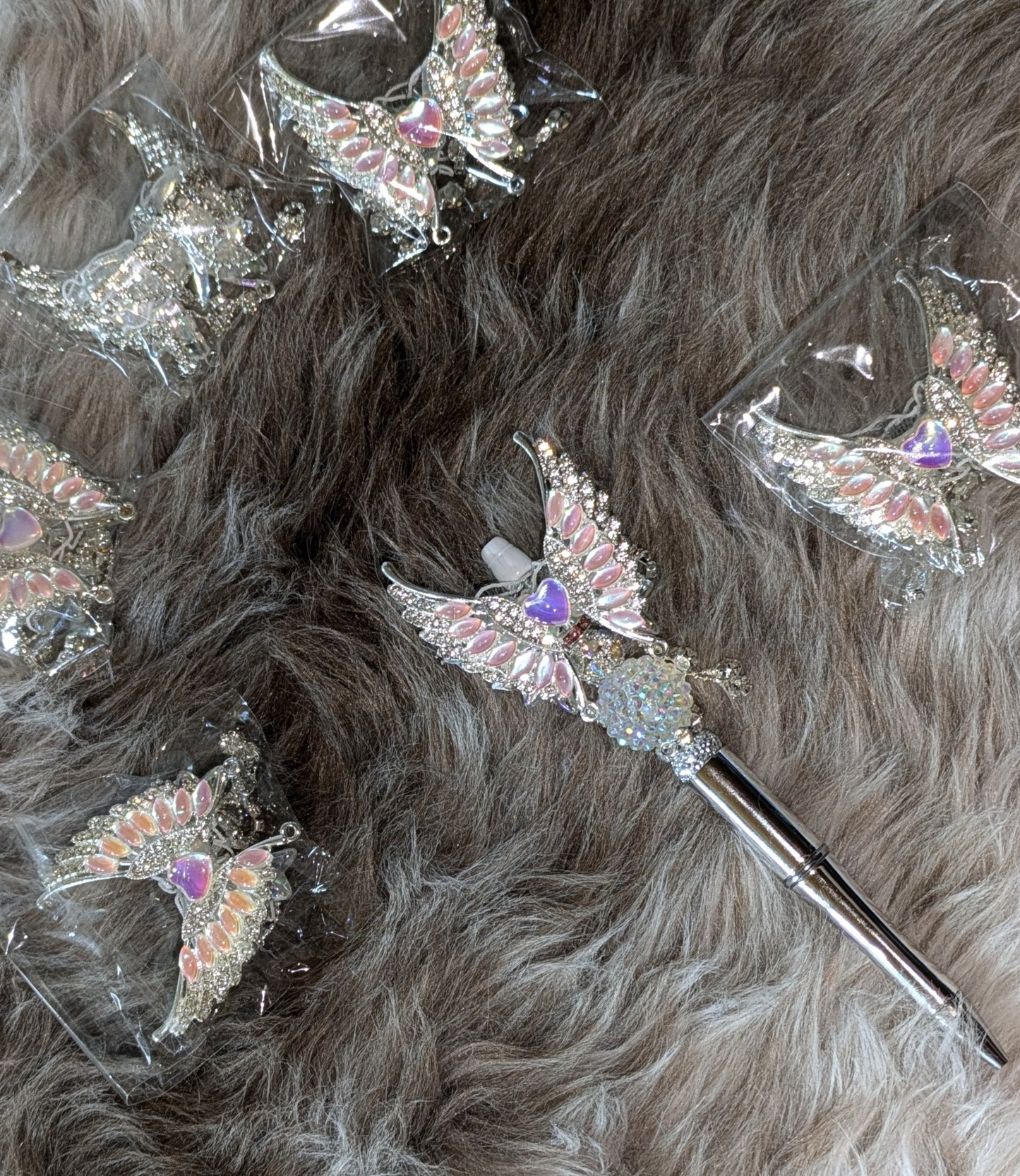 Atemberaubend schöne Regenbogen Engelsflügel aus Metall mit viel Stass Holo