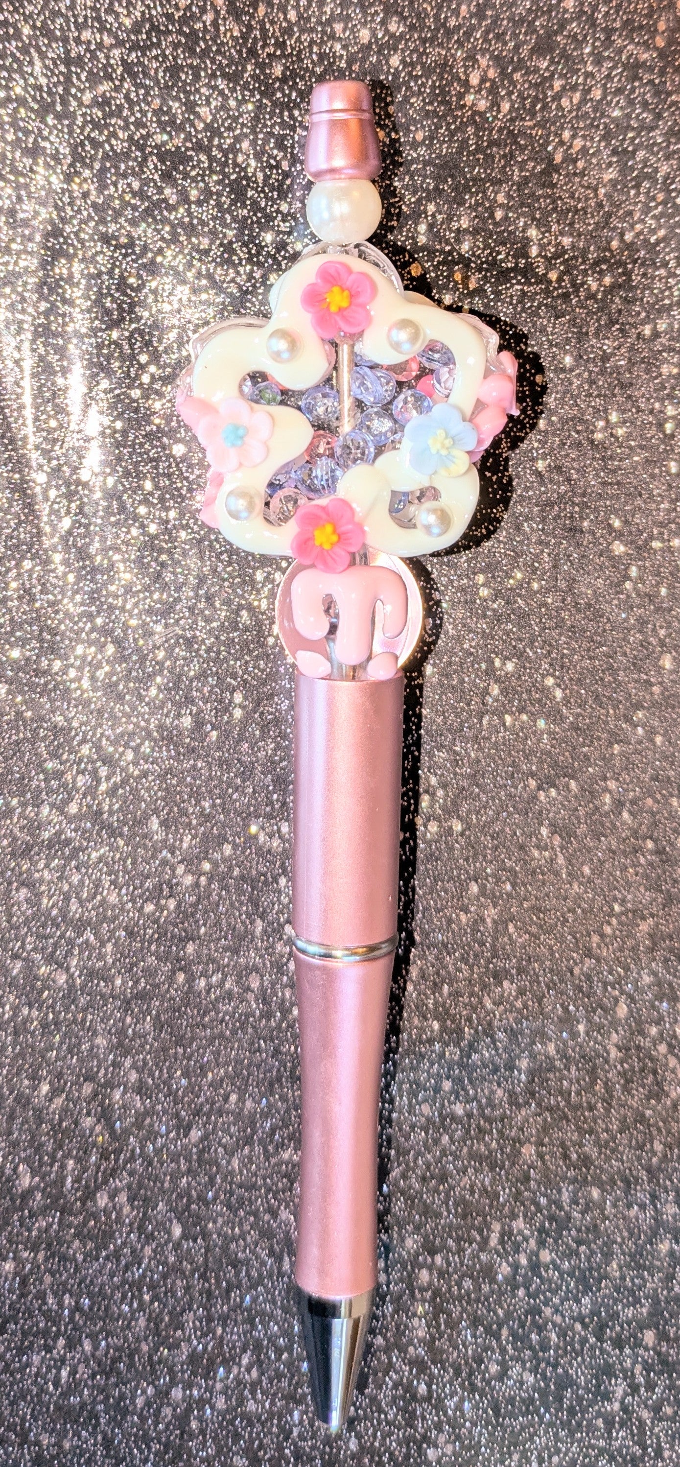 Schüttelkugelschreiber Blumenperle gefüllt mit kleinen Diamanten in rosa