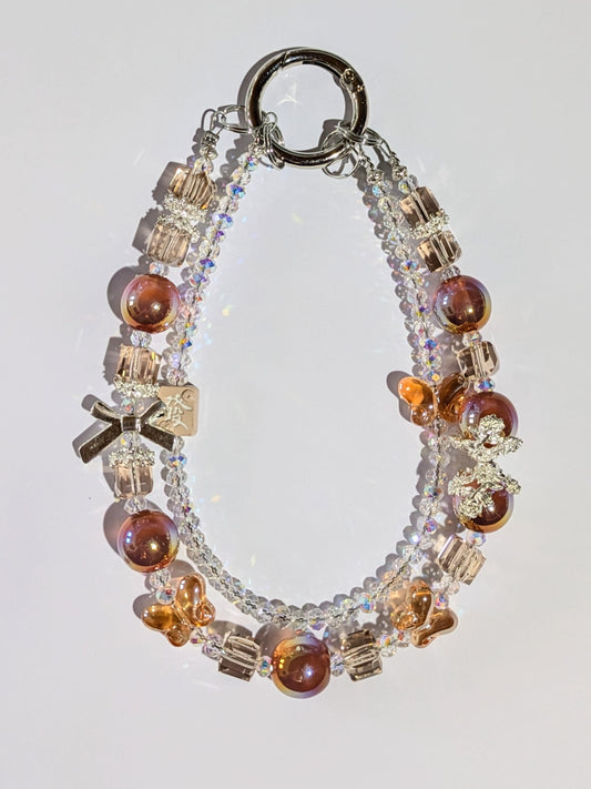 Hochwertige Handykette aus Glas- und Metallperlen in Kaffeebraun mit Schmetterlingen und Rosenverziehrungen