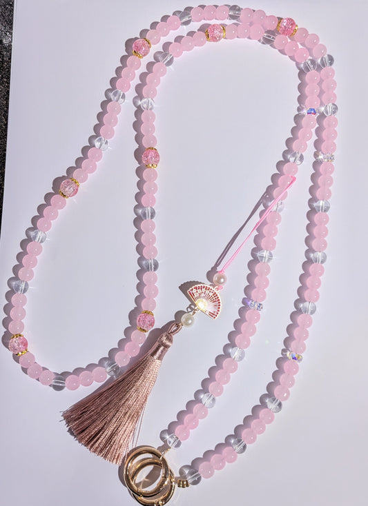 Hochwertige Elegante Handykette ca. 120 cm aus Glas- und Metallperlen in klar rosa mit Quaste und Metallfächer-Anhänger